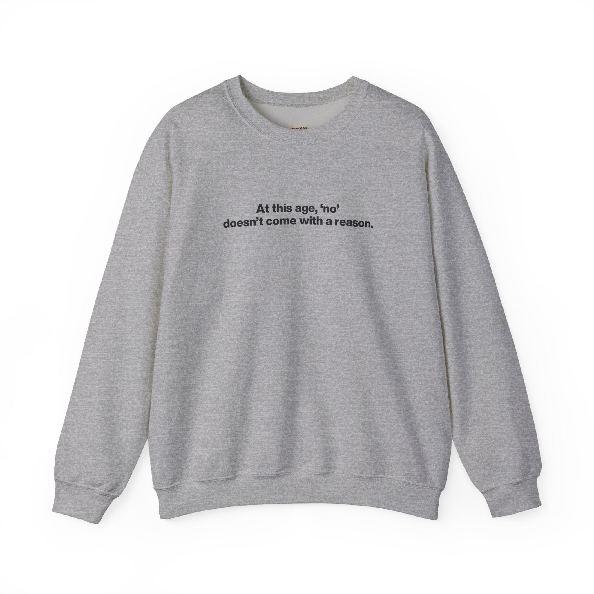 Crewneck Sweatshirt — Minimal Text ‘At this age, “no” doesn’t come with a reason.’ Casual Comfort Tee for Women & Men