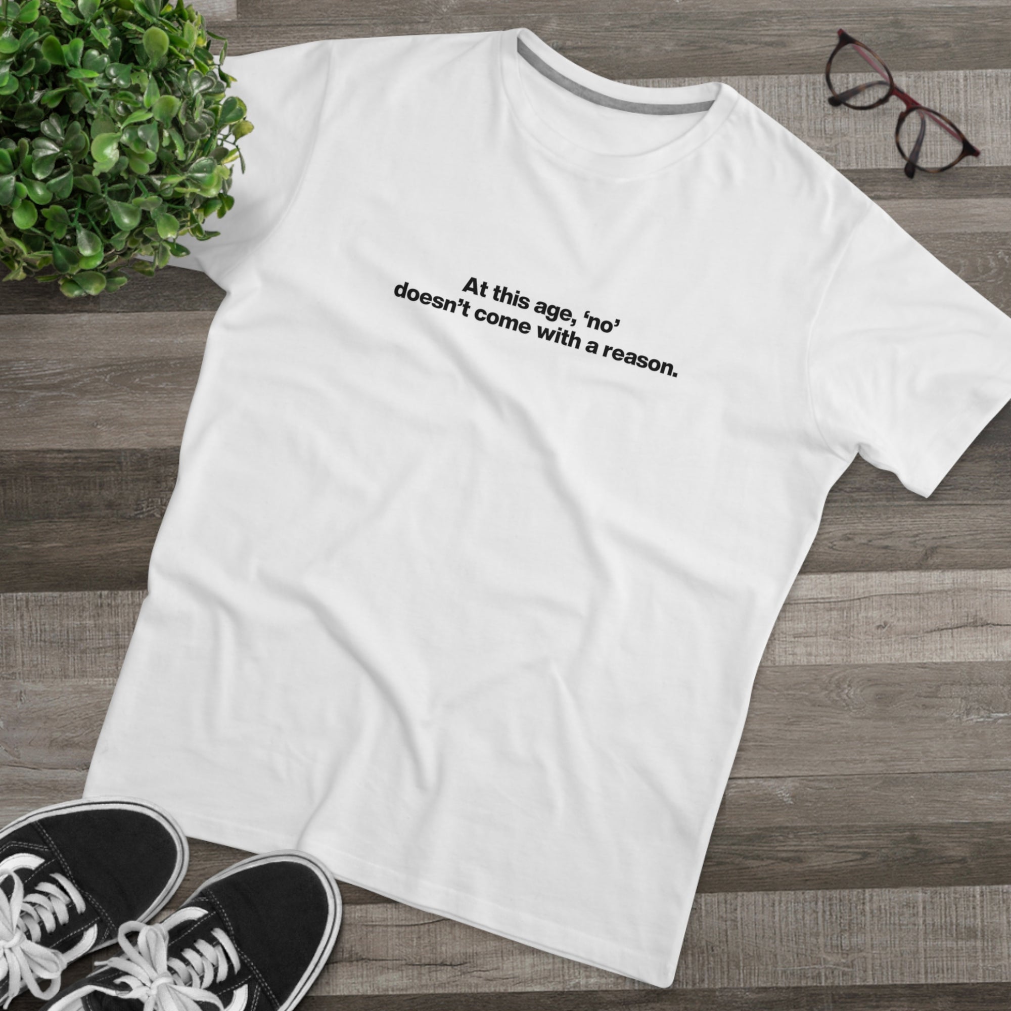 Men's Tee — "At this age, 'no' doesn't come with a reason." Minimalist Statement Shirt
