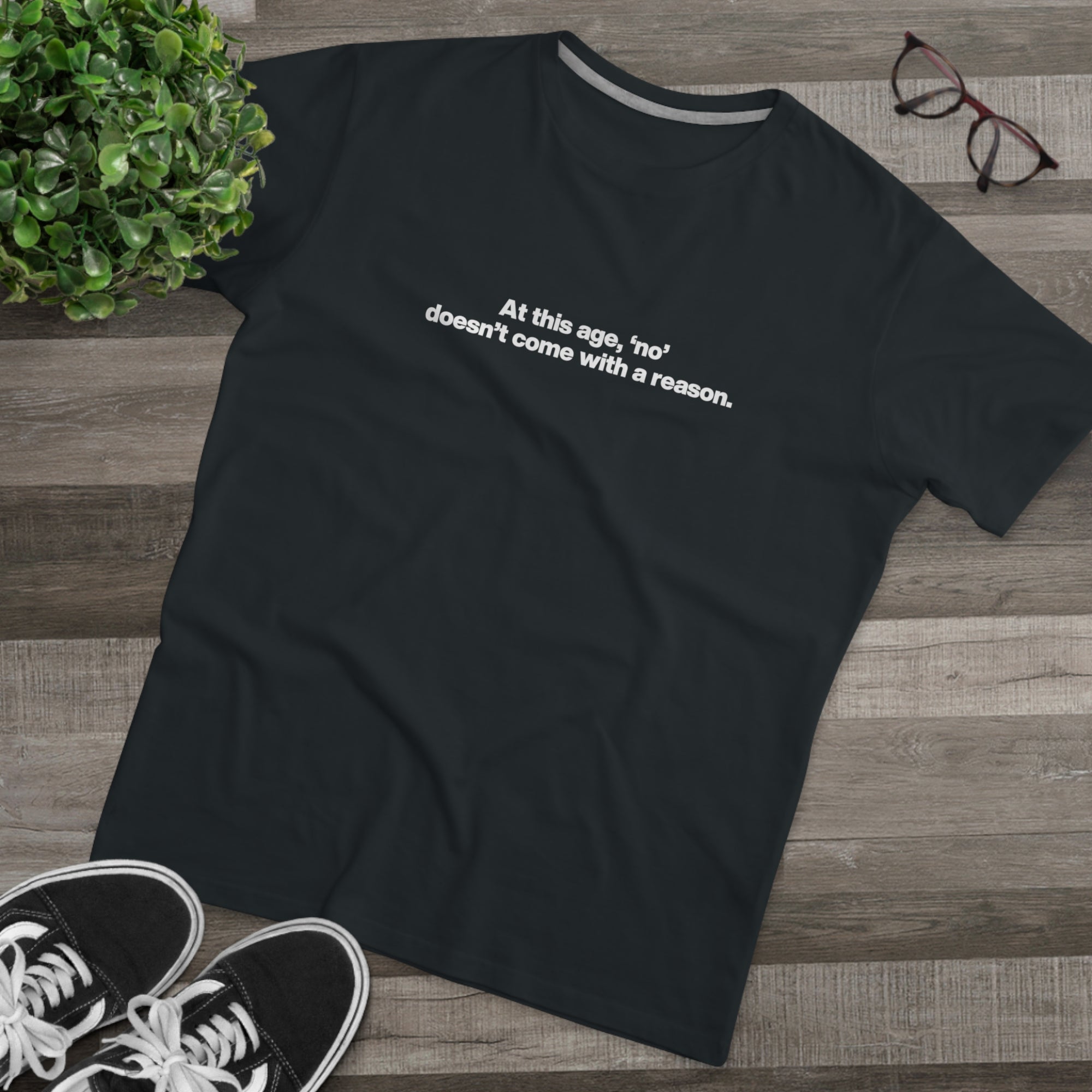 Men's Tee — "At this age, 'no' doesn't come with a reason." Minimalist Statement Shirt