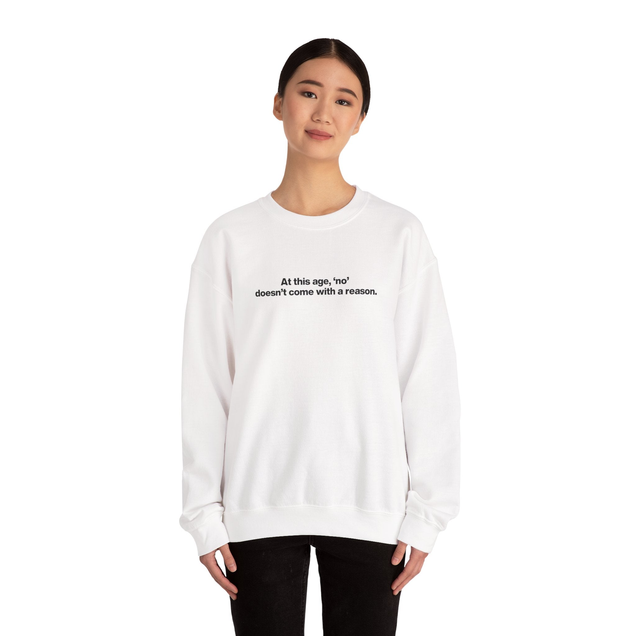 Crewneck Sweatshirt — Minimal Text ‘At this age, “no” doesn’t come with a reason.’ Casual Comfort Tee for Women & Men