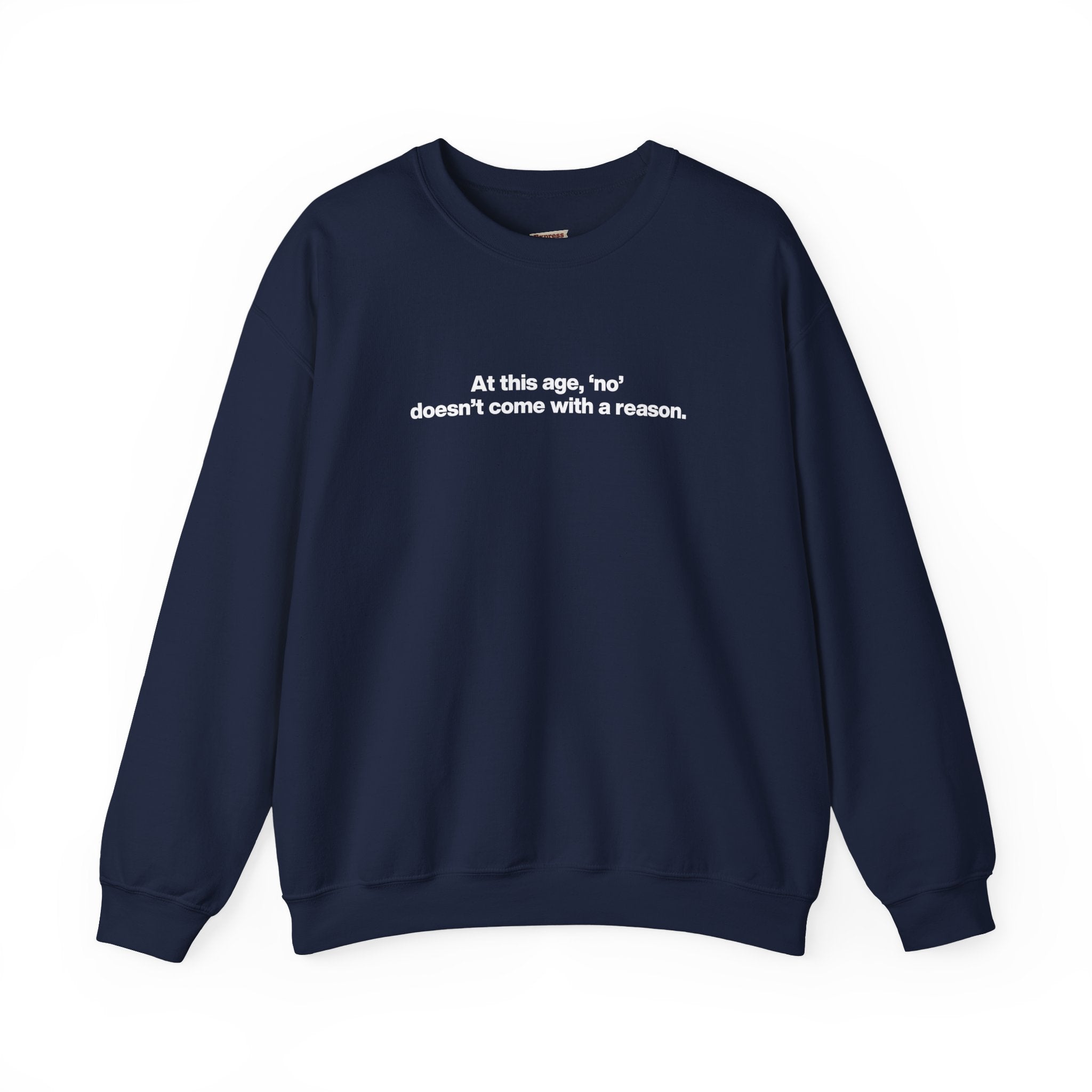 Crewneck Sweatshirt — Minimal Text ‘At this age, “no” doesn’t come with a reason.’ Casual Comfort Tee for Women & Men