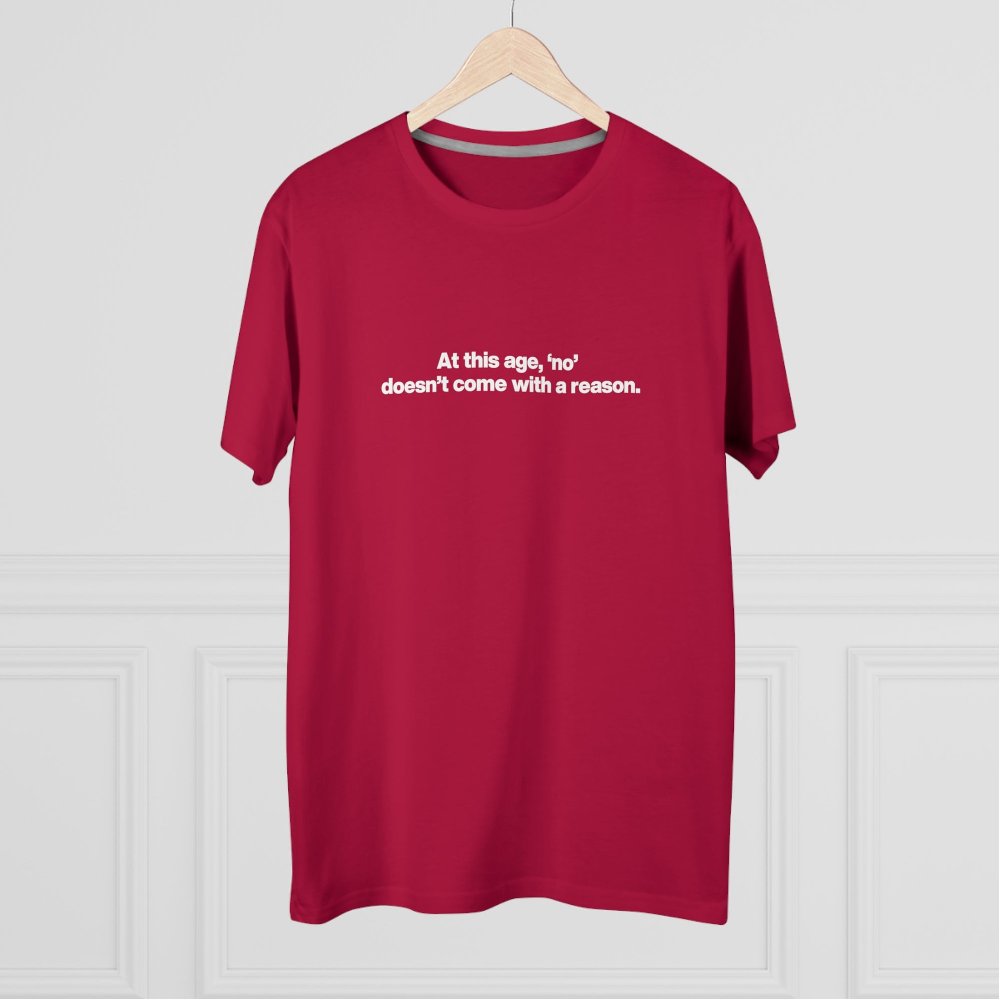 Men's Tee — "At this age, 'no' doesn't come with a reason." Minimalist Statement Shirt