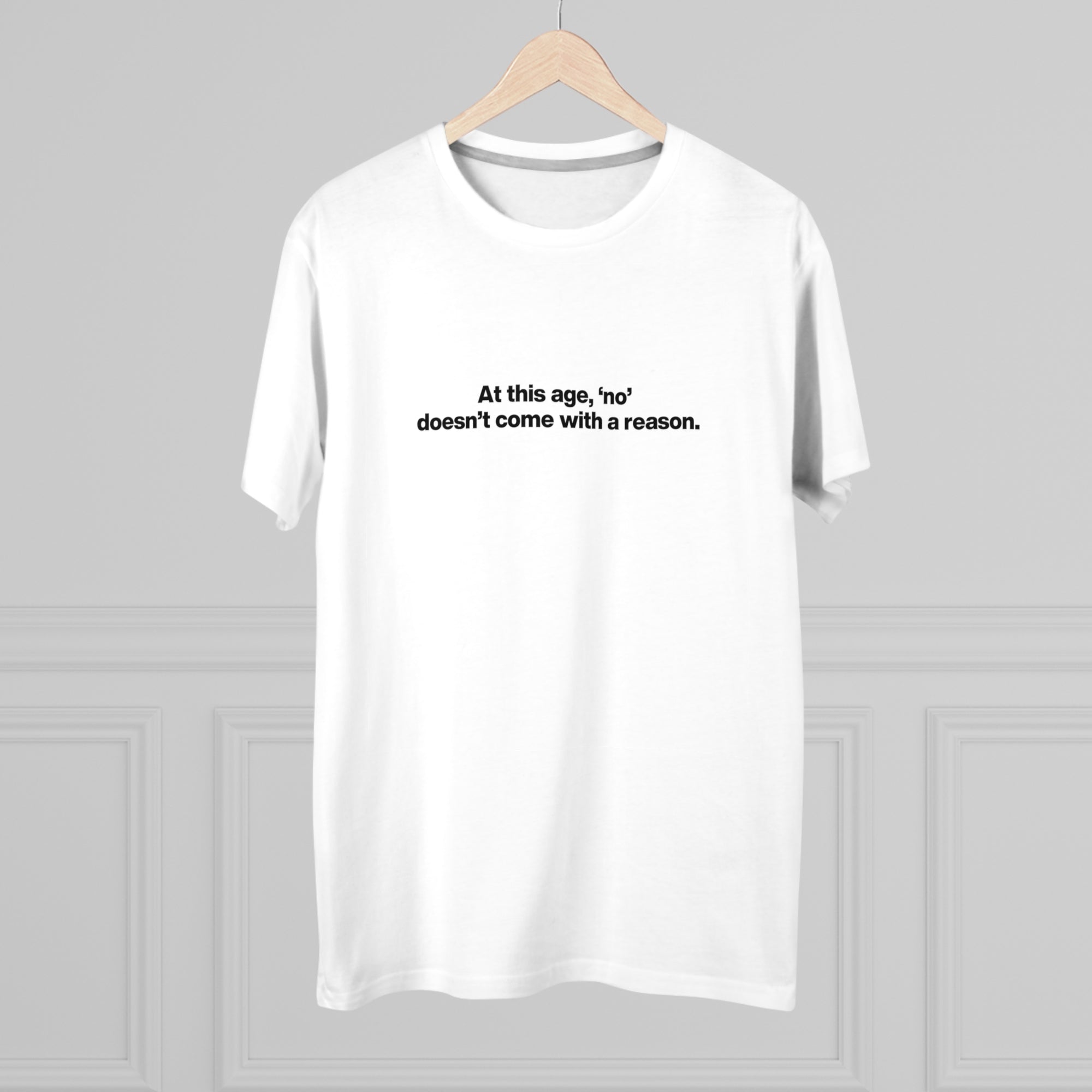 Men's Tee — "At this age, 'no' doesn't come with a reason." Minimalist Statement Shirt